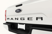 Back of a white 2024-2026 Ford Ranger truck with visible branding.