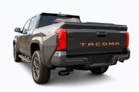 Black 2024-2026 Toyota Tacoma truck on a white background