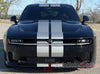 Black Dodge Charger with white racing stripes on a road, featuring 'AutoMotorStripes' branding. 2024-2026 Dodge Charger Racing Stripes N-Charge Rally 24 R/T Scat Pack Daytona Factory Quality Mopar Style Vinyl Graphic Kit 3M