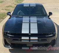 Black 2026 Dodge Charger Sixpack car with white racing stripes on a driveway, featuring 'AutoMotorStripes' branding.