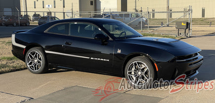 Black 2026 Dodge Charger muscle car with 'Sixpack' vinyl graphics branding on a paved surface.