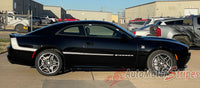 Black 2026 Dodge Charger muscle car with 'Sixpack' stripe in a parking lot.