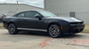 Black 2024-2026 Dodge Charger Sixpack  muscle car with white stripes on a concrete surface, featuring 'AutoMotorStripes' logo.