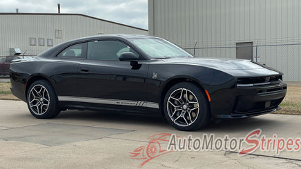 Black 2024-2026 Dodge Charger Sixpack  muscle car with white stripes on a concrete surface, featuring 'AutoMotorStripes' logo.