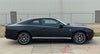 Black 2024-2026 Dodge Charger Sixpack with side stripes on a concrete surface, with 'AutoMotorStripes' branding.