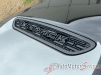 2026 Dodge Charger Sixpack with 'Sixpack' decal on the hood, branded 'AutoMotorStripes'.