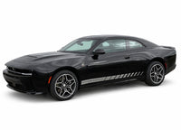 Black 2024-2026 Dodge Charger Sixpack muscle car with racing stripes on a white background