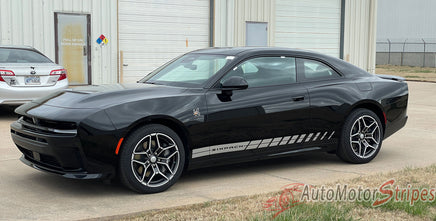 Black 2024-2026 Dodge Charger Sixpack with racing stripes parked in front of a building
