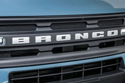 Detailed view of 2021-2026 Ford Bronco Full Size LETTER TEXT Front Grill Decals Accent Vinyl Graphics 3M